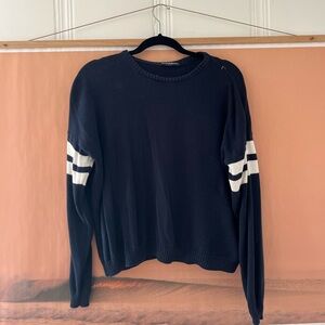 Brandy Melville variety sweater with white stripes on sleeves